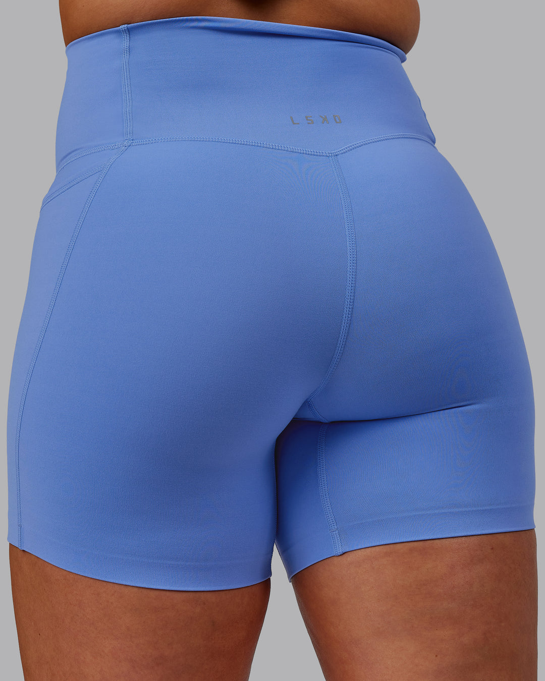 Woman wearing Elixir Mid Short Tights with Pockets - Ultramarine