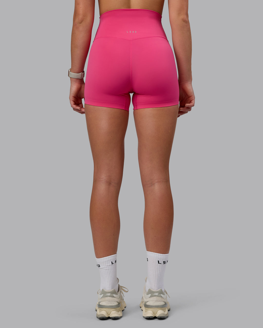 Woman wearing Elixir X-Short Tights - Pink Flash