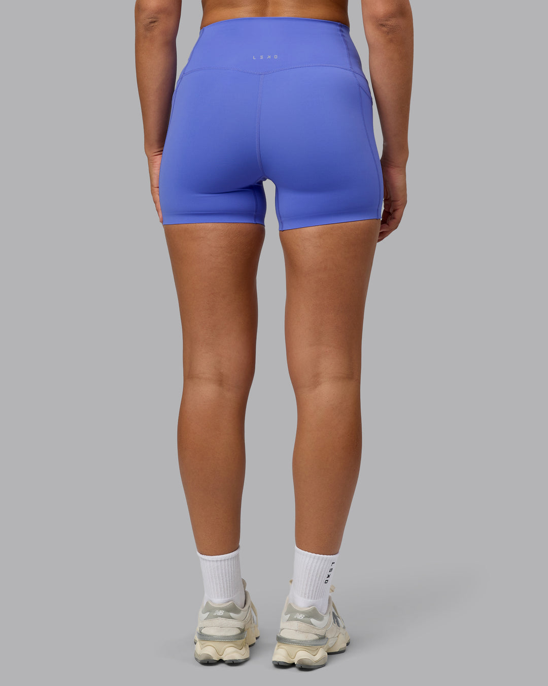 Woman wearing Elixir X-Short Tights With Pockets - Baja Blue