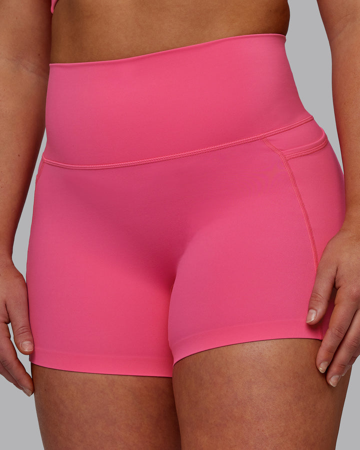 Woman wearing Elixir X-Short Tights With Pockets - Carmine Rose
