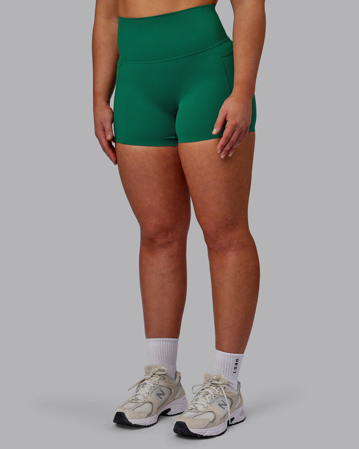 Woman wearing Elixir X-Short Tights With Pockets - Malachite
