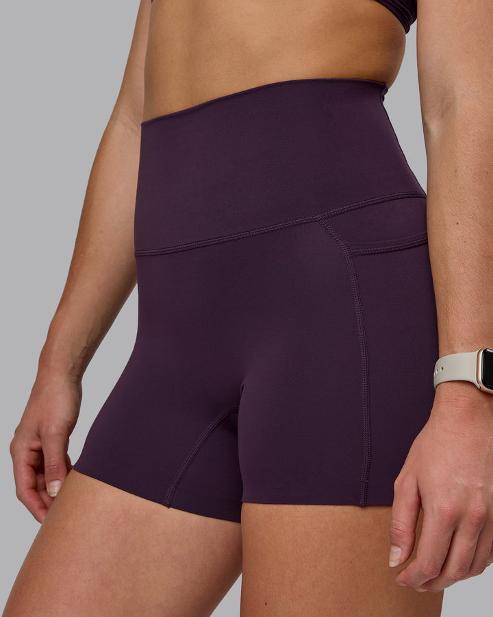 Woman wearing Elixir X-Short Tights With Pockets - Midnight Plum
