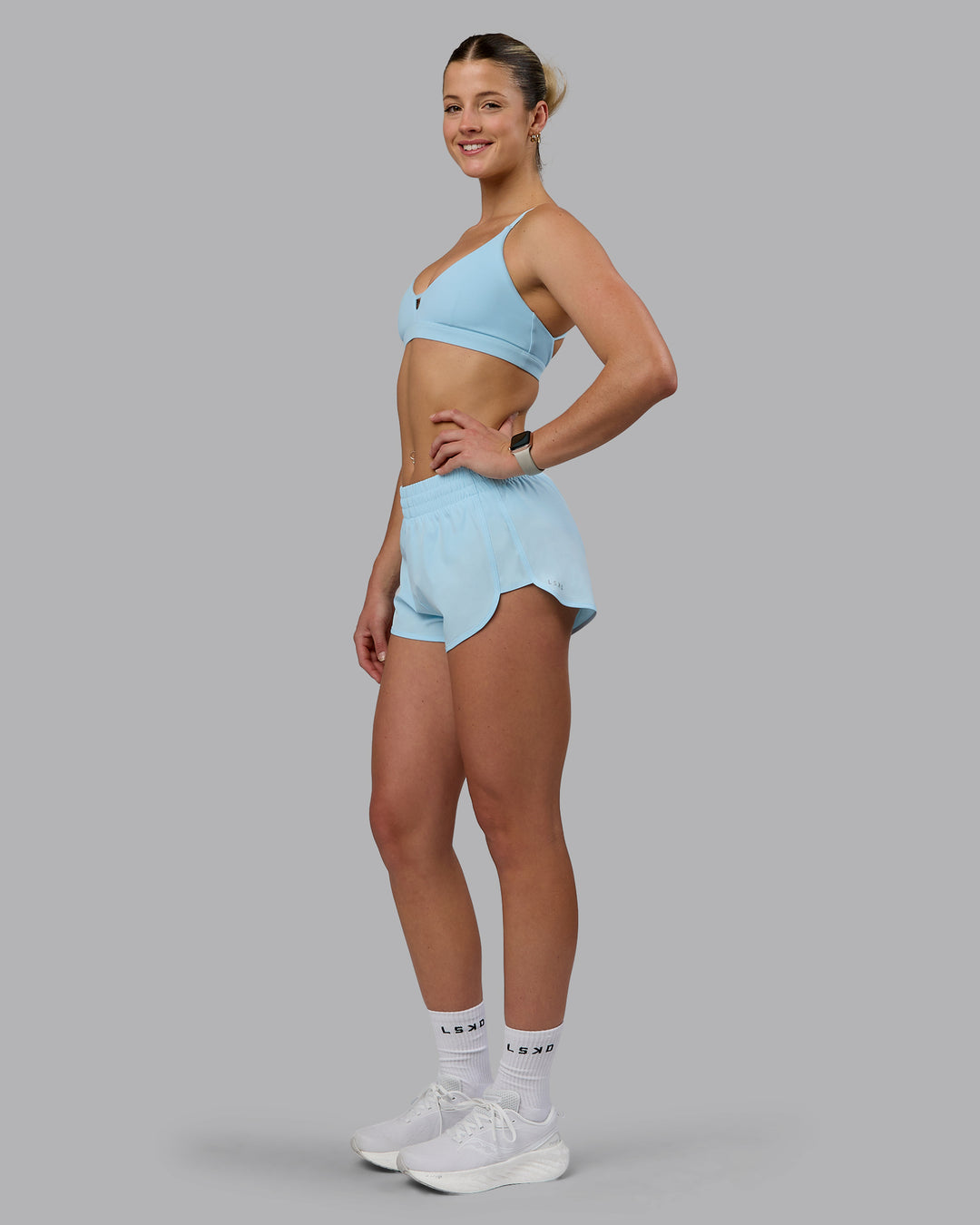 Woman wearing Energy 1.8&quot; Training Shorts - Crystal Blue