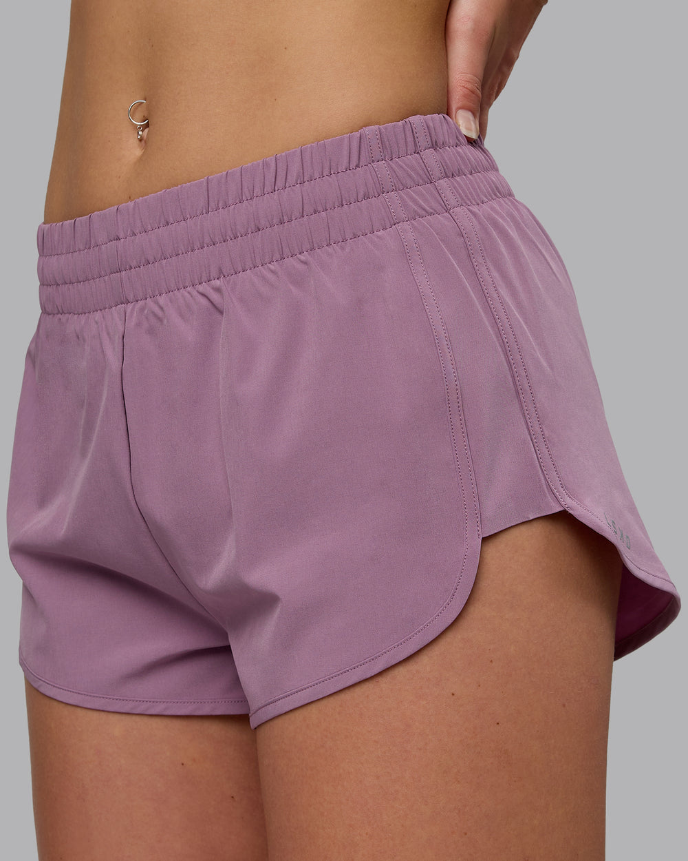 Woman wearing Energy 1.8" Training Shorts - Grape