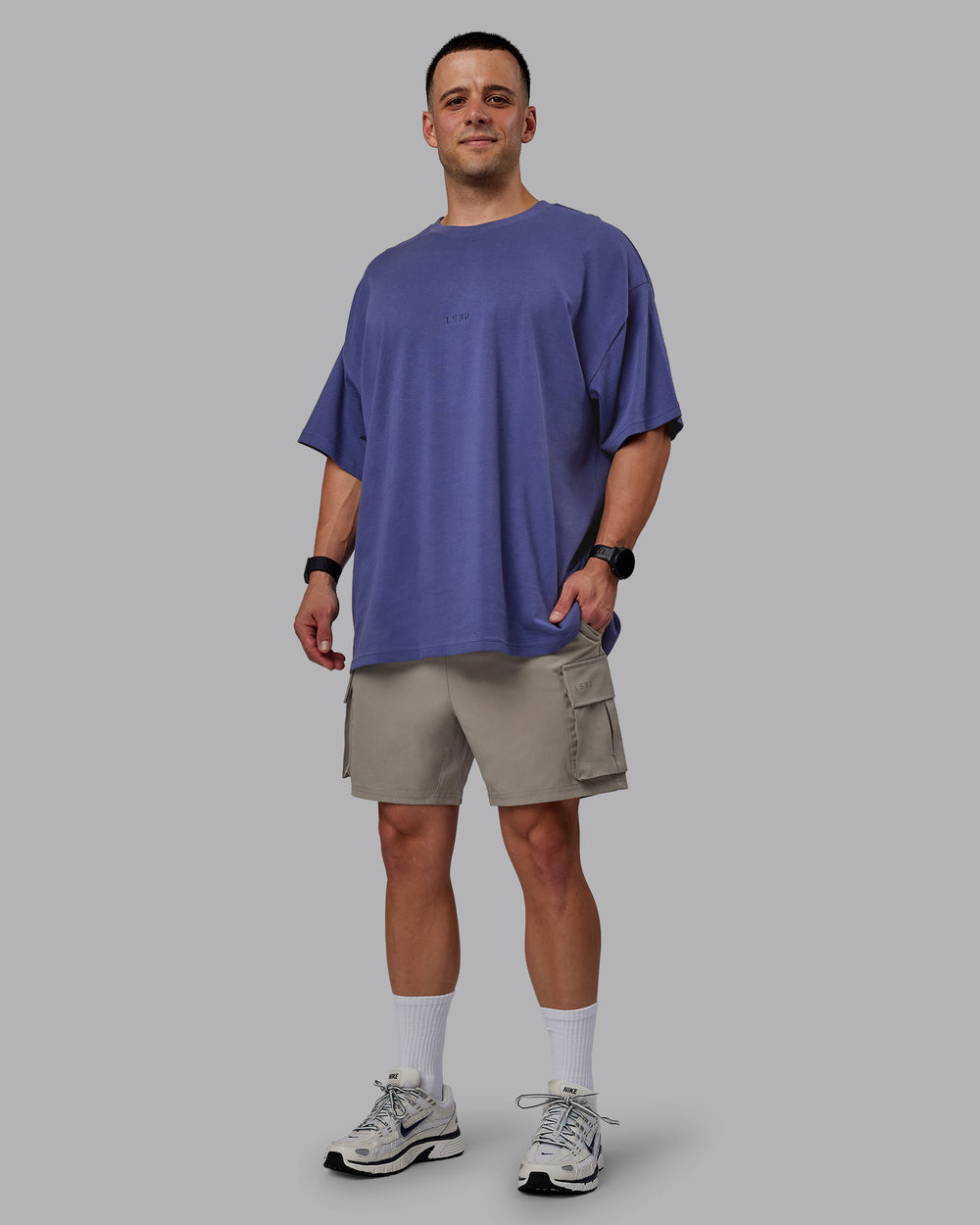 Man wearing Energy Stretch Performance Cargo Shorts - Elephant