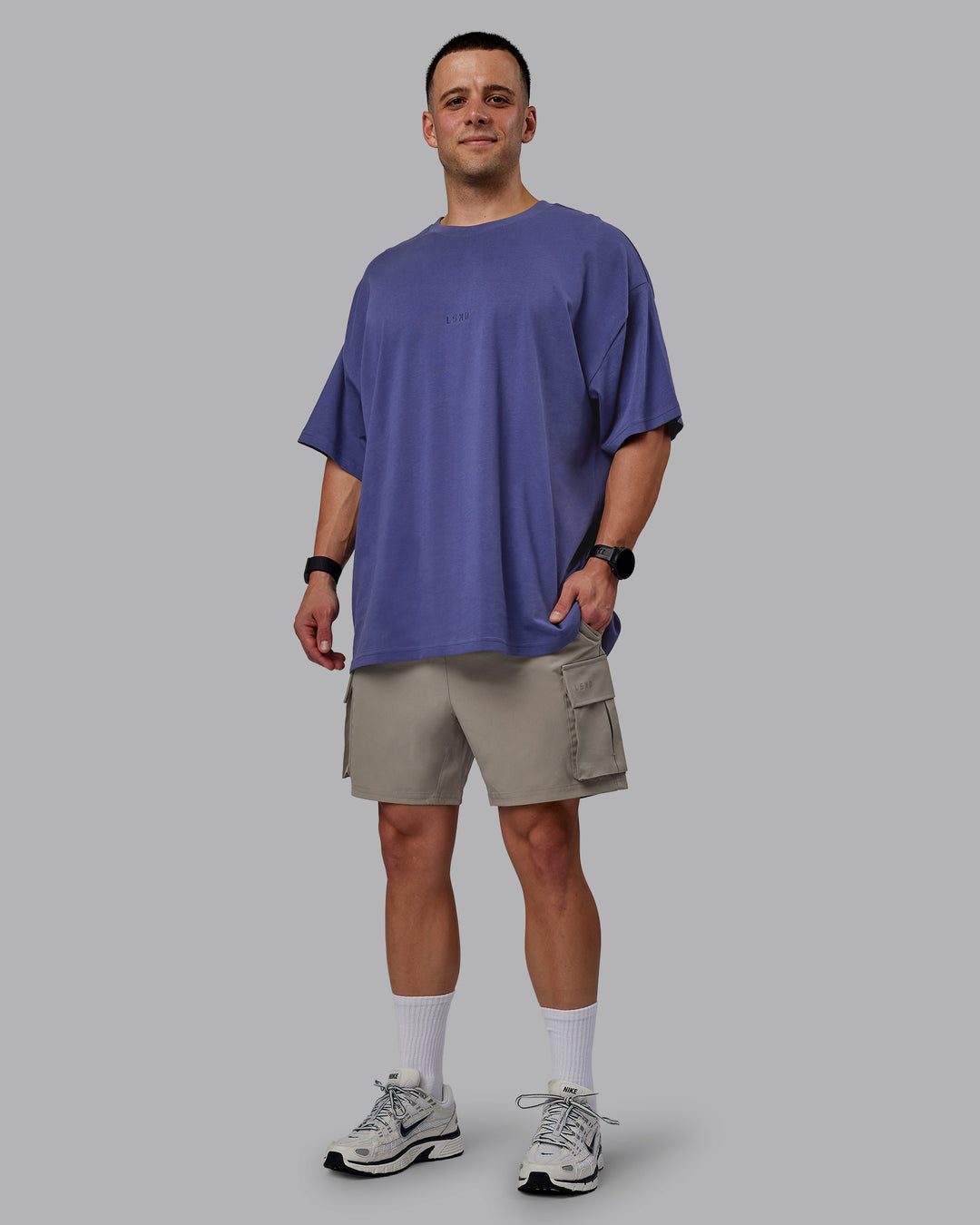 Man wearing Energy Stretch Performance Cargo Shorts - Elephant