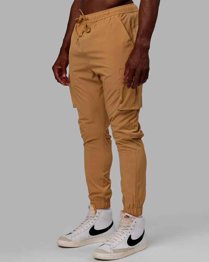 Man wearing Energy Stretch Performance Cargo Joggers - Latte
