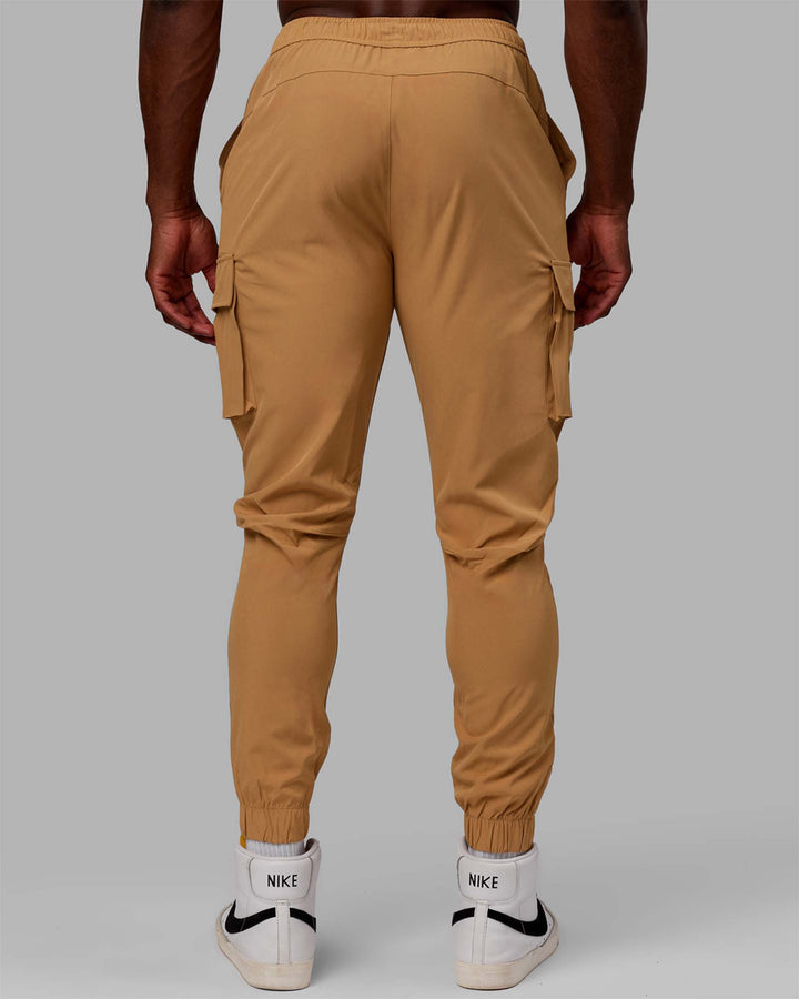 Man wearing Energy Stretch Performance Cargo Joggers - Latte
