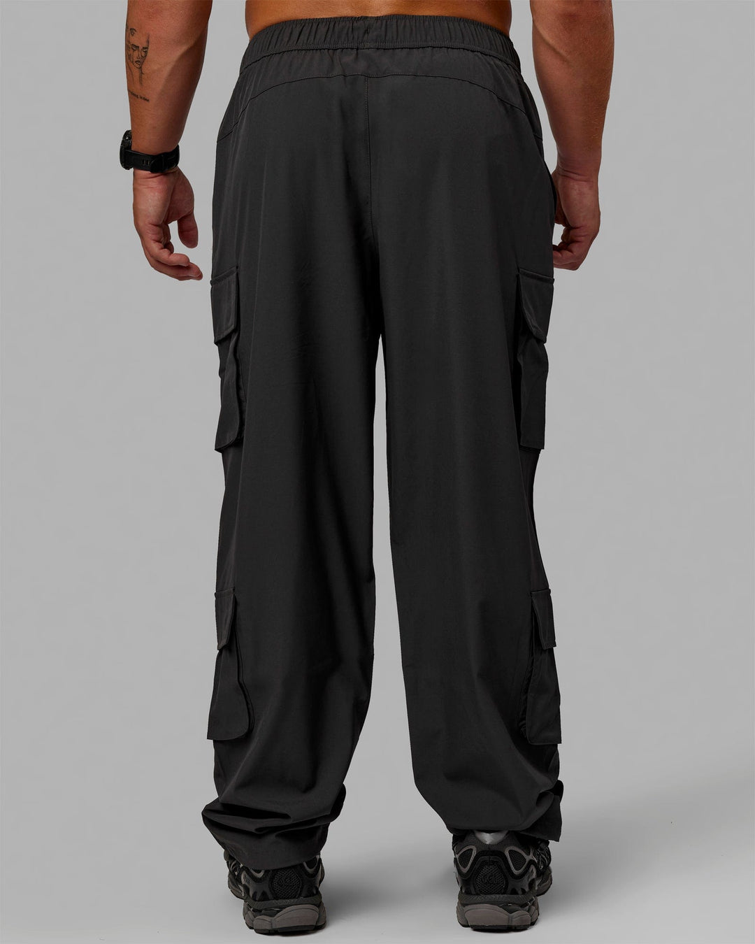 Man wearing Energy Stretch Relaxed Fit Cargo Pants - Pirate Black