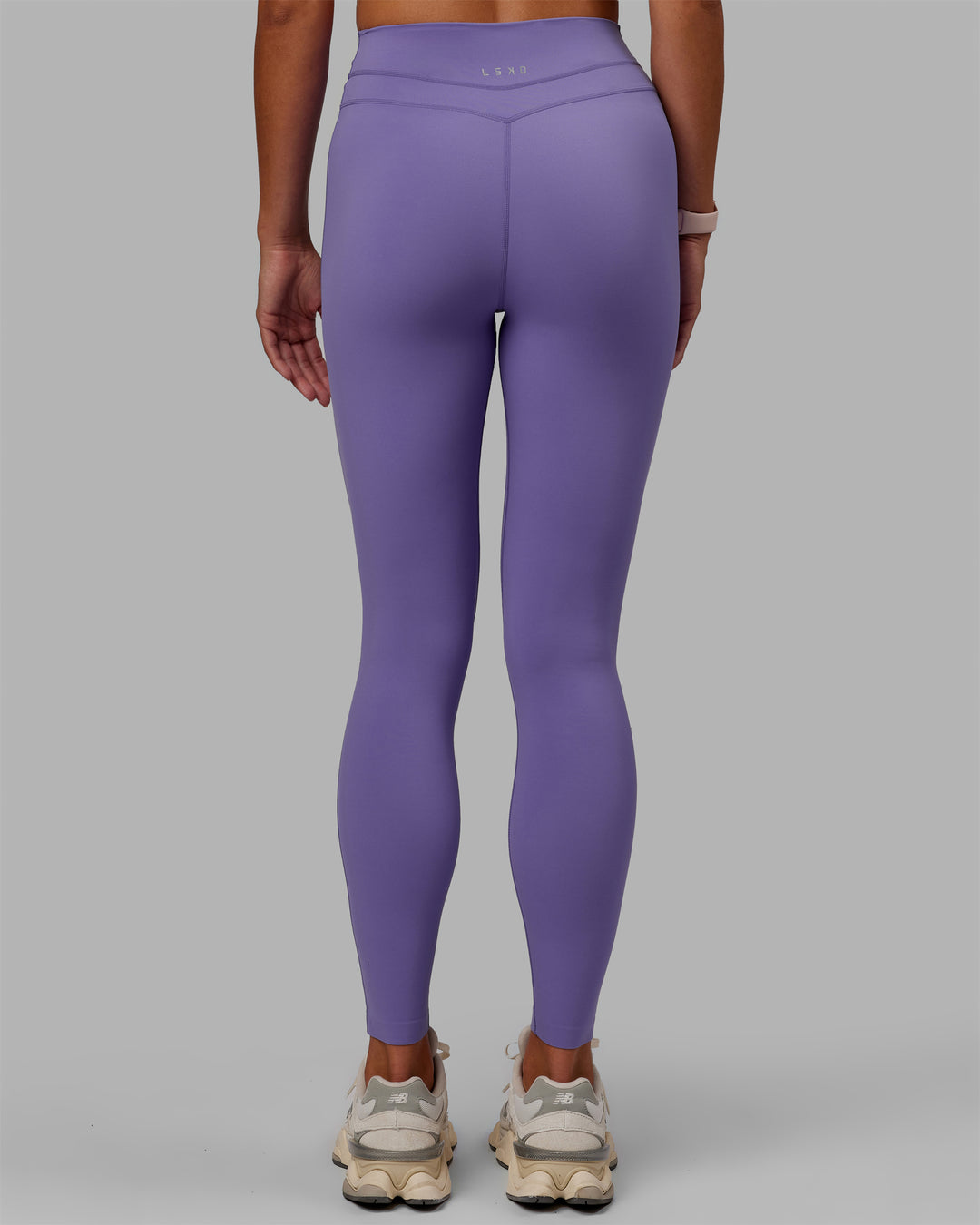 Woman wearing Enhance Full Length Tights - Dahlia Purple