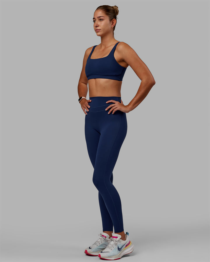 Woman wearing Enhance Full Length Tight - Midnight Blue
