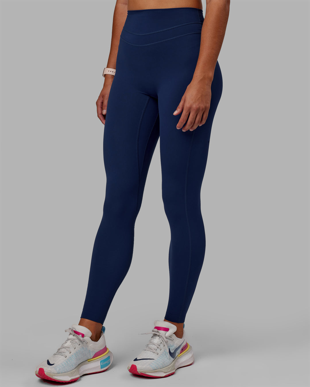 Woman wearing Enhance Full Length Tight - Midnight Blue