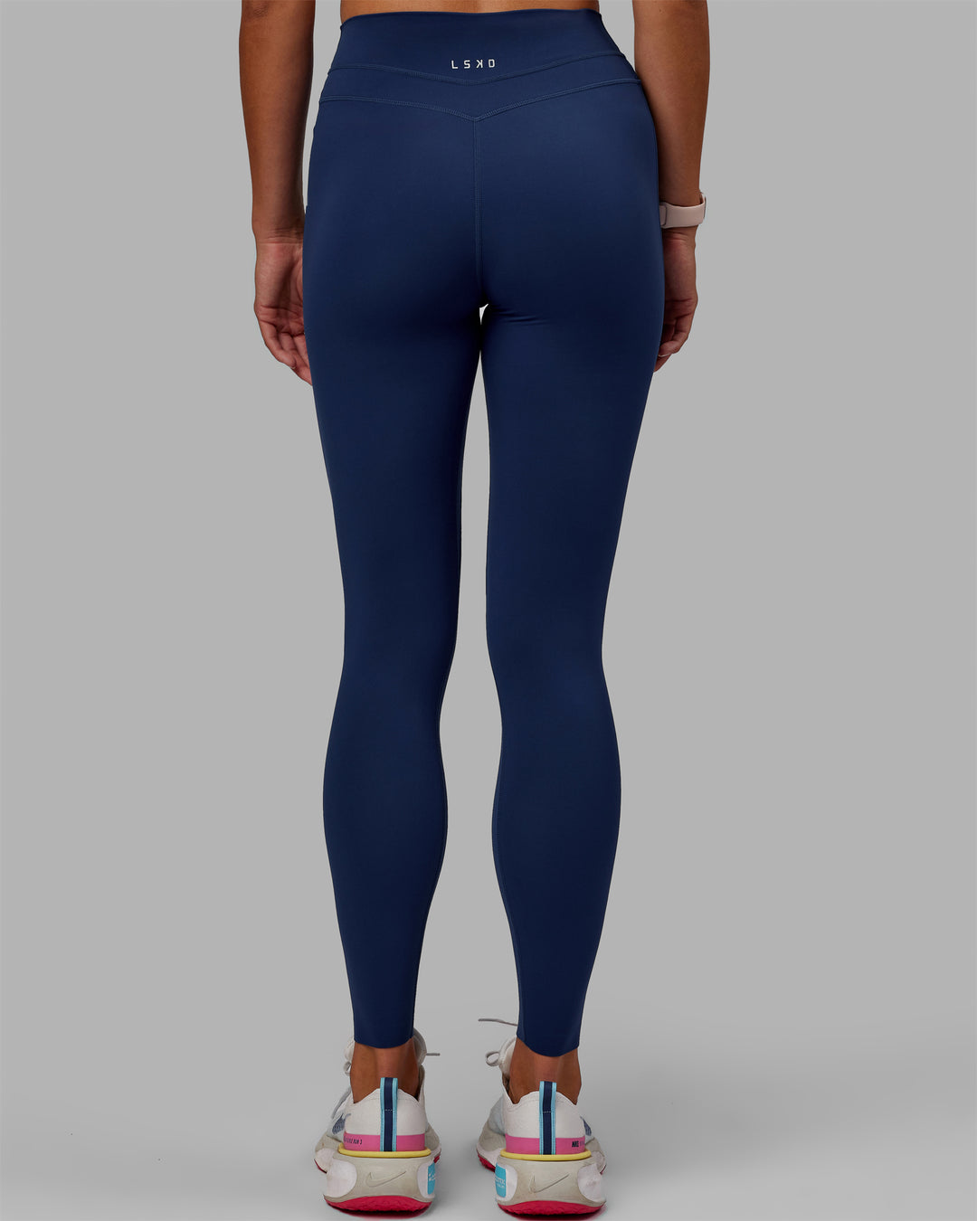 Woman wearing Enhance Full Length Tight - Midnight Blue