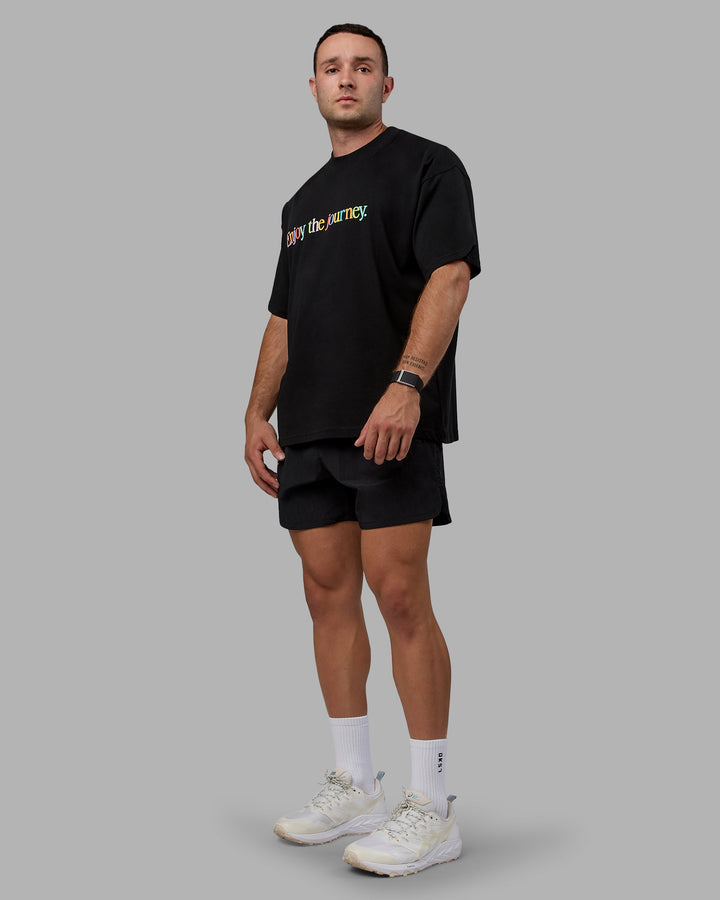 Man wearing Enjoy The Journey 5&quot; Shorts - Black-Multi
