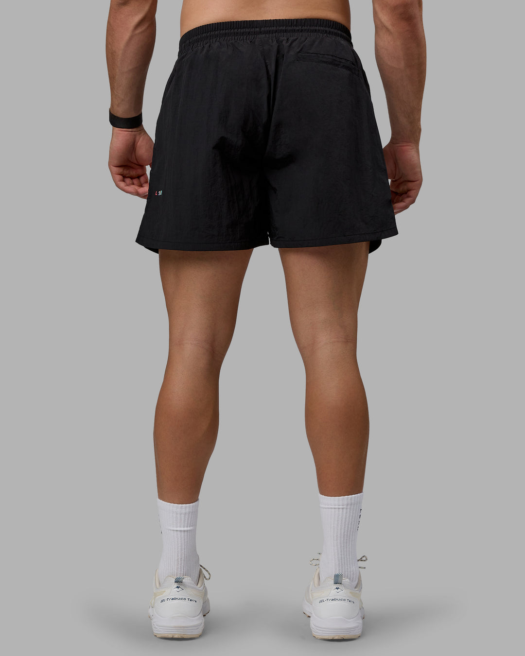 Man wearing Enjoy The Journey 5&quot; Shorts - Black-Multi