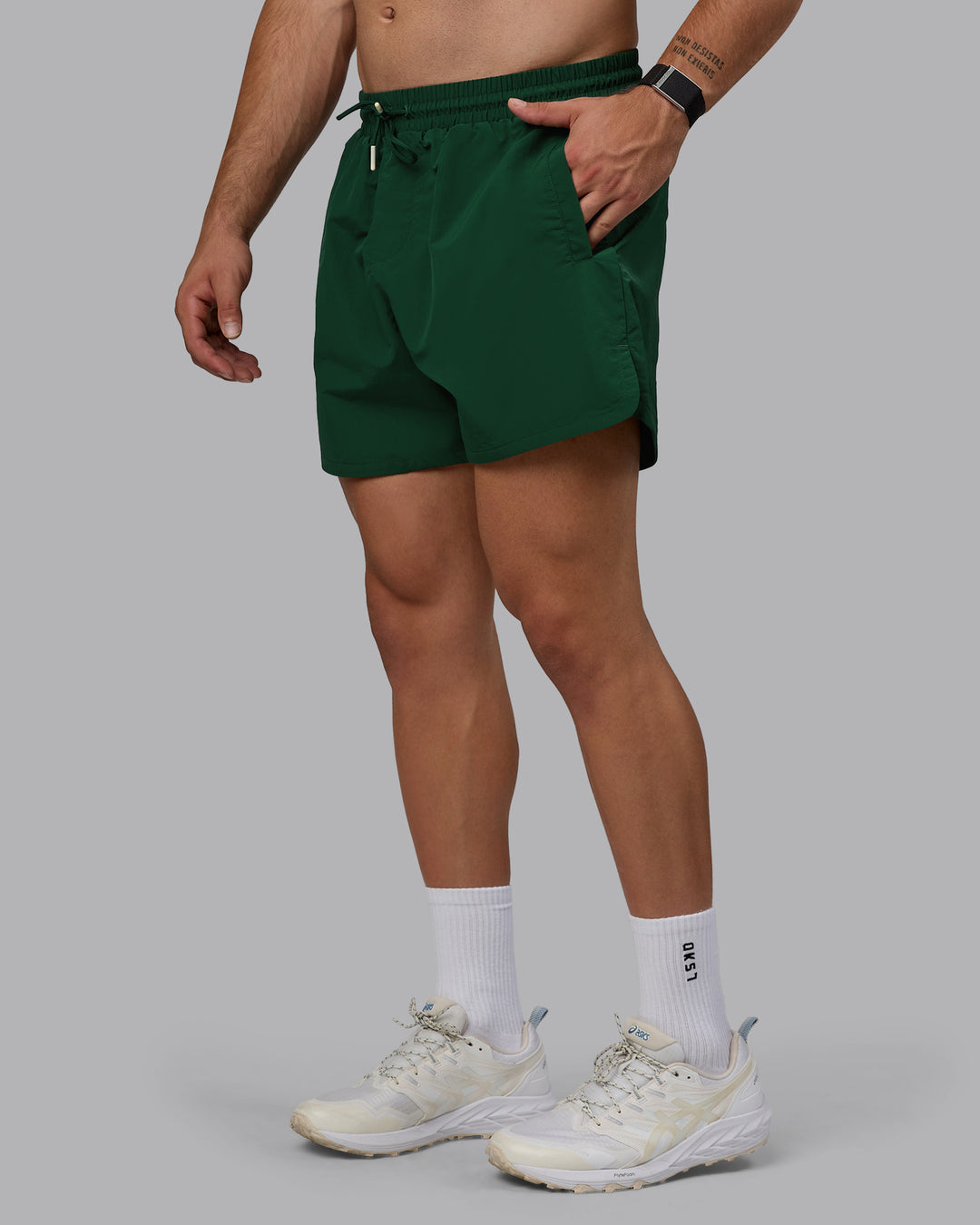 Man wearing Enjoy The Journey 5&quot; Shorts - Deep Emerald-Off White