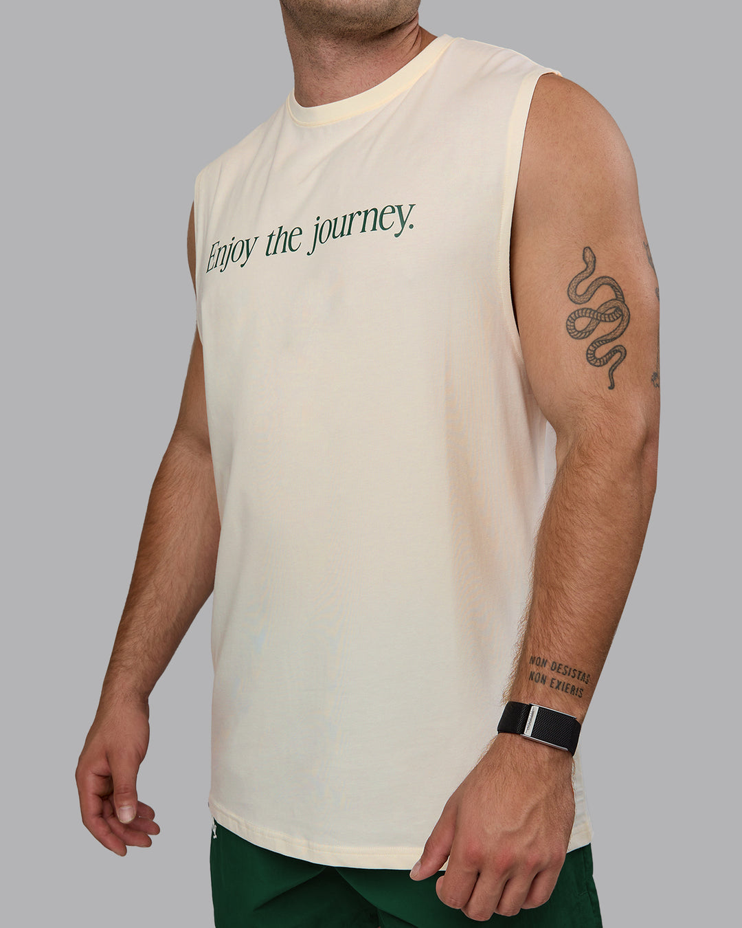 Man wearing Enjoy The Journey FLXCotton Tank - Off White-Deep Emerald