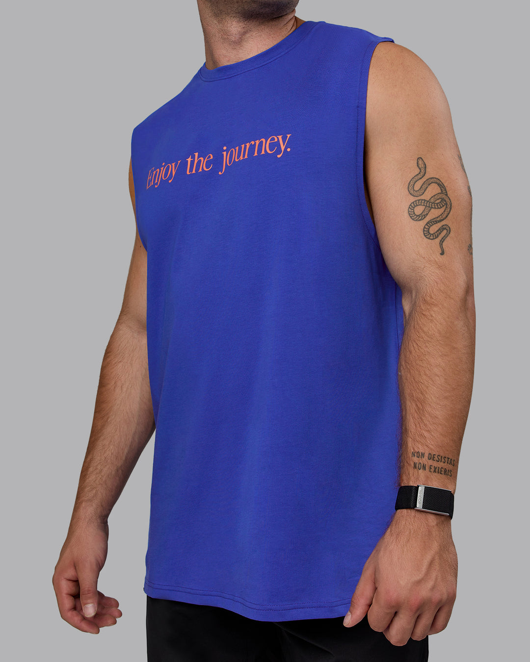 Man wearing Enjoy The Journey FLXCotton Tank - Power Cobalt-Orange