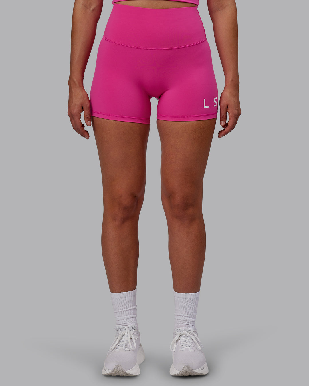 Woman wearing Evolved X-Short Tights - Fuchsia Pink-White