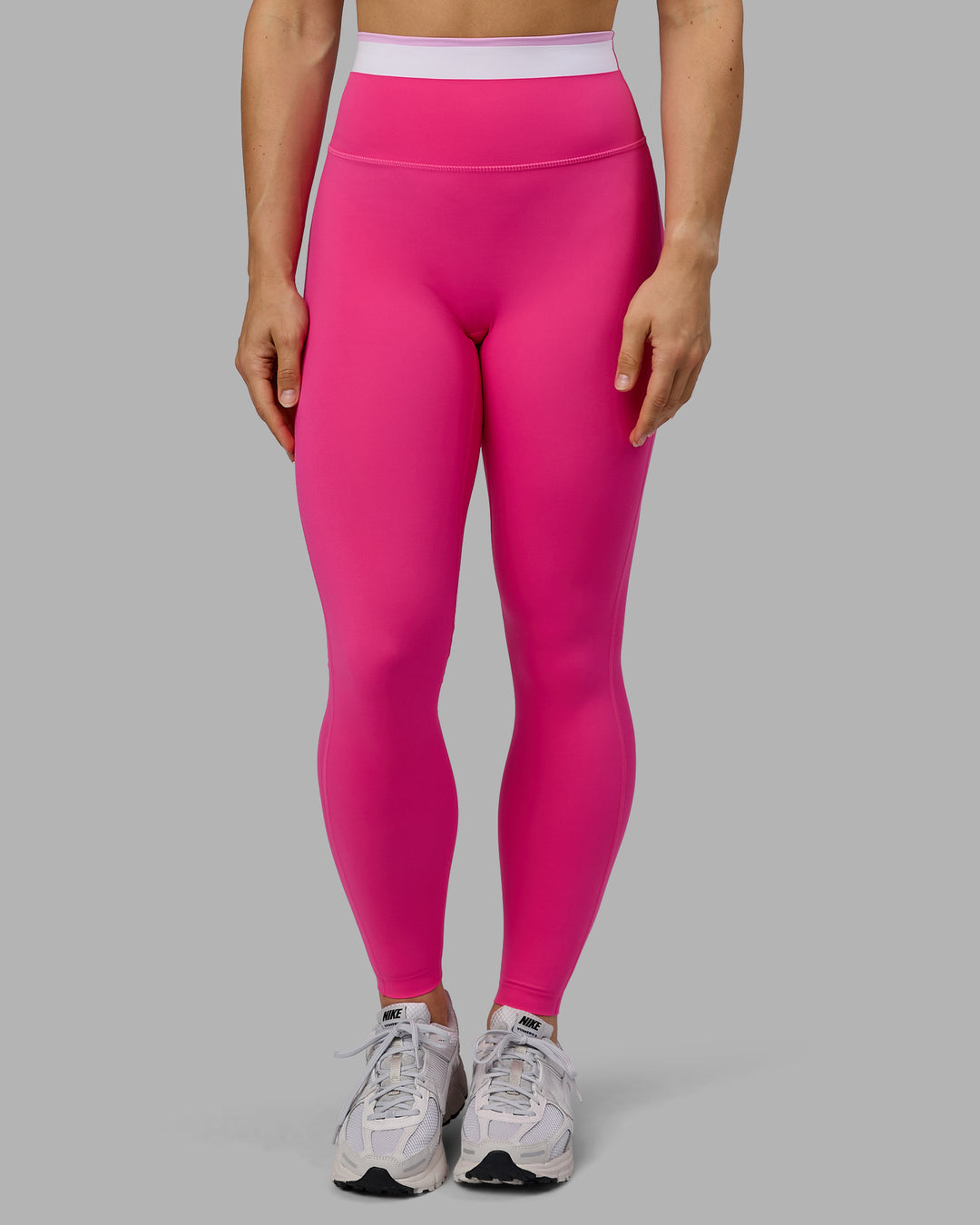 Woman wearing Excel Full Length Tights - Ultra Pink