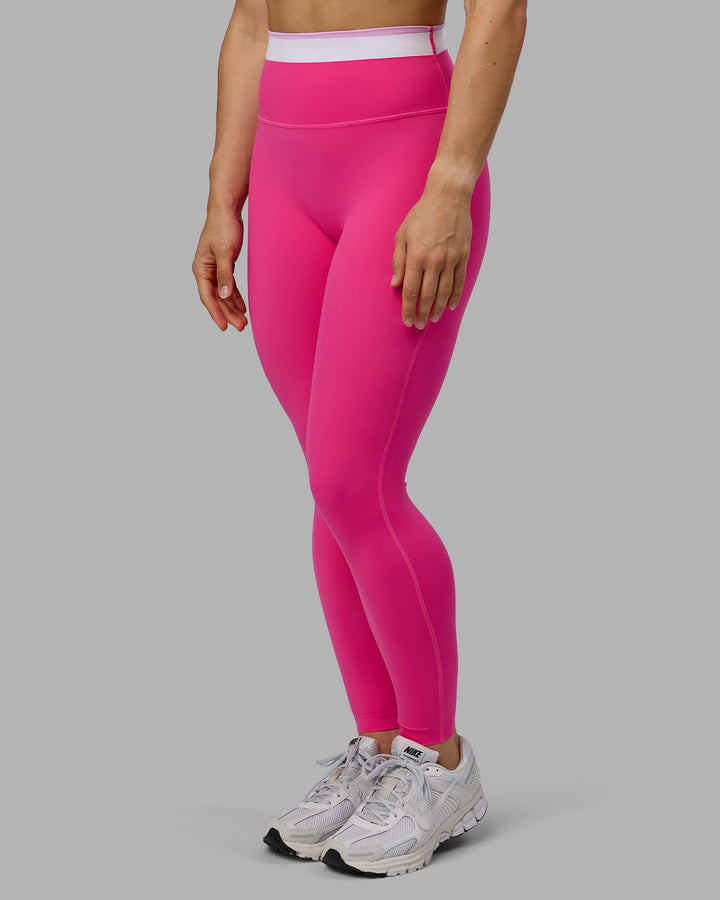 Woman wearing Excel Full Length Tights - Ultra Pink
