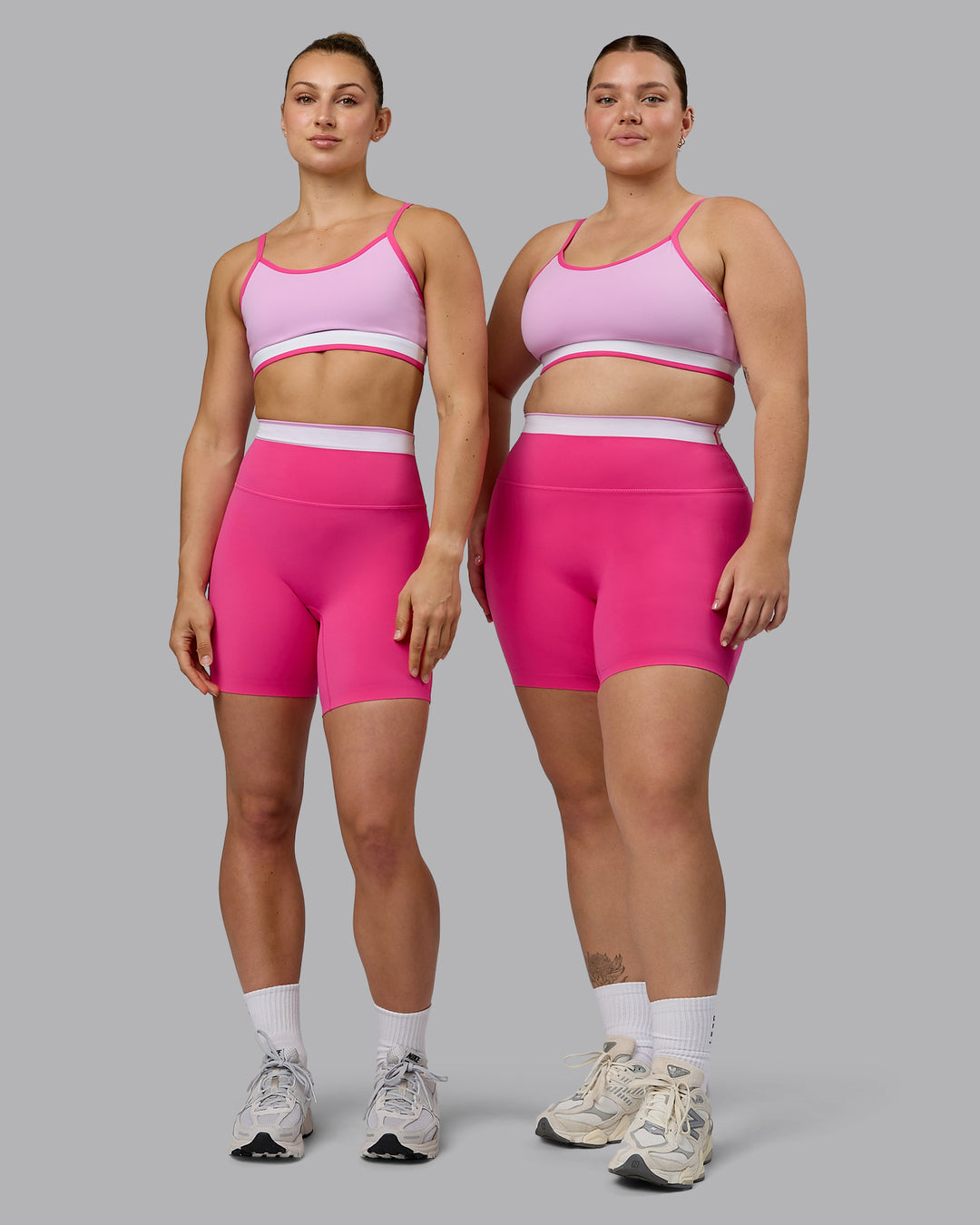 Woman wearing Excel Mid Short Tights - Ultra Pink