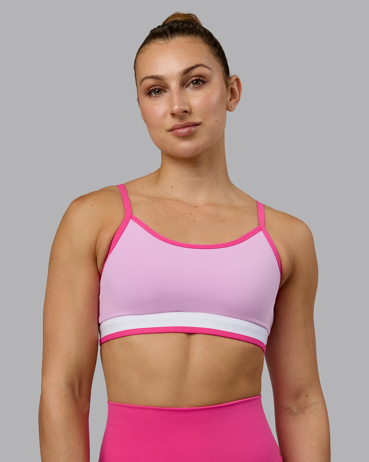 Woman wearing Excel Sports Bra - Pastel Orchid
