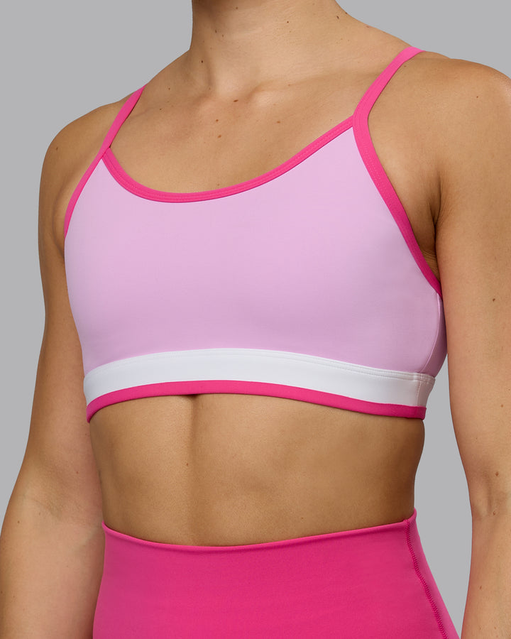 Woman wearing Excel Sports Bra - Pastel Orchid
