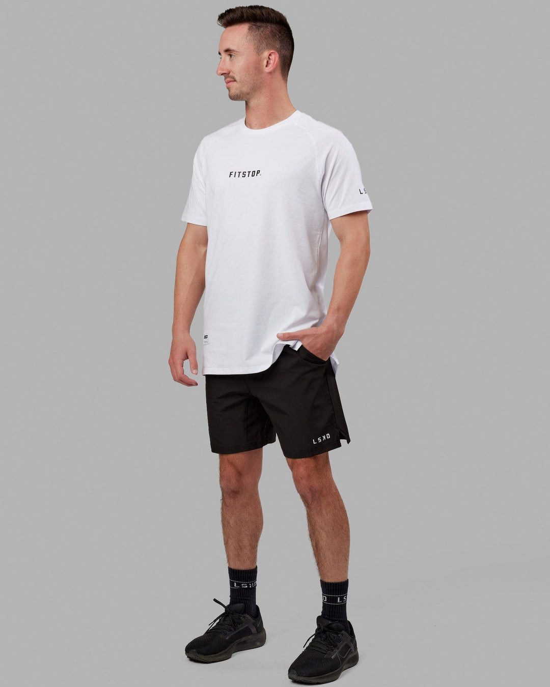 Man wearing Fitstop Optimal Tee - White