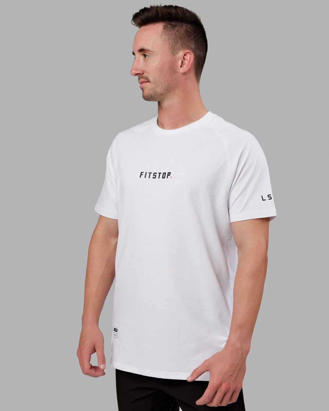 Man wearing Fitstop Optimal Tee - White