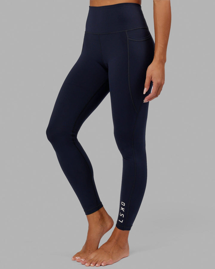 Woman wearing Flux Full Length Tight - Navy
