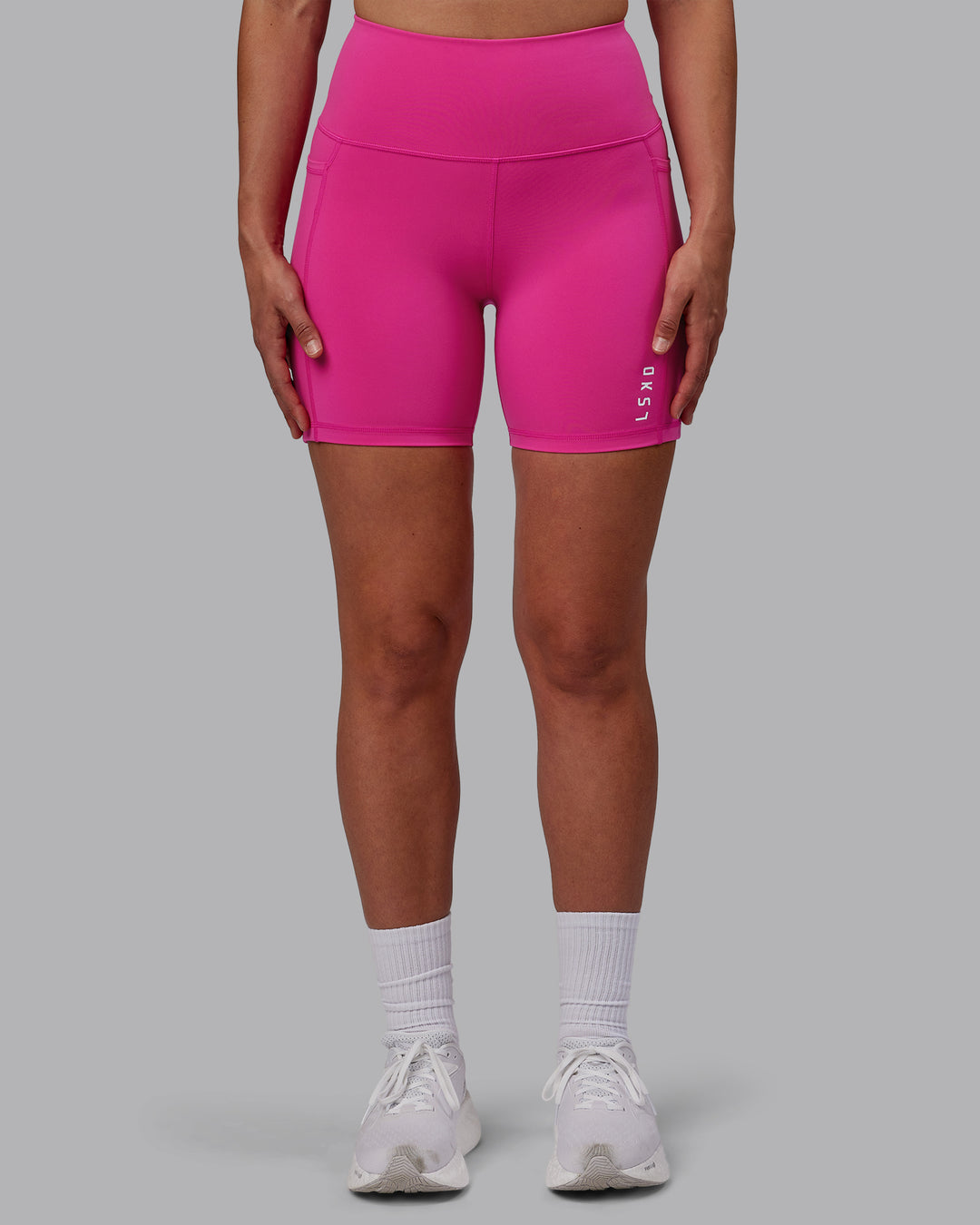 Woman wearing Flux Mid Short Tights - Fuchsia Pink