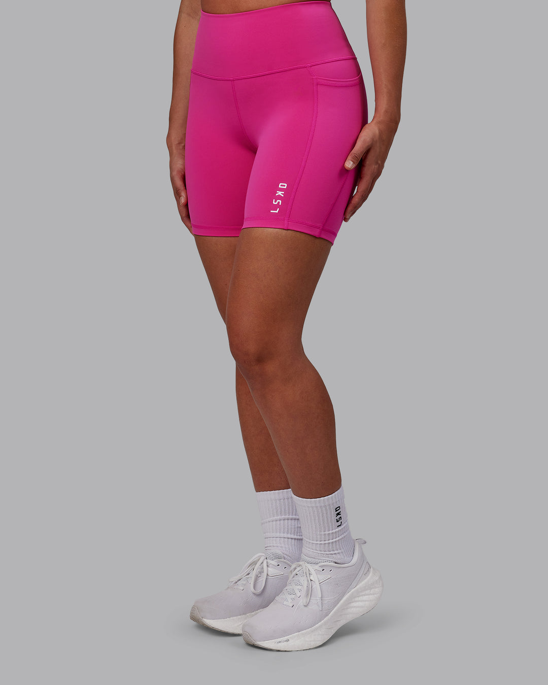 Woman wearing Flux Mid Short Tights - Fuchsia Pink