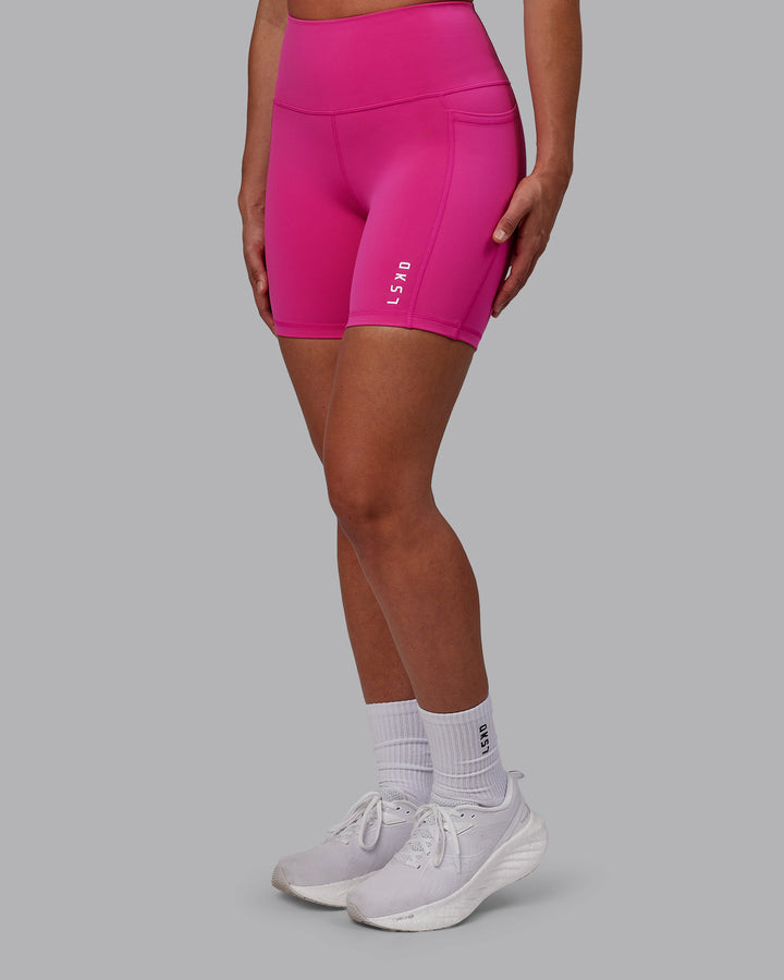 Woman wearing Flux Mid Short Tights - Fuchsia Pink
