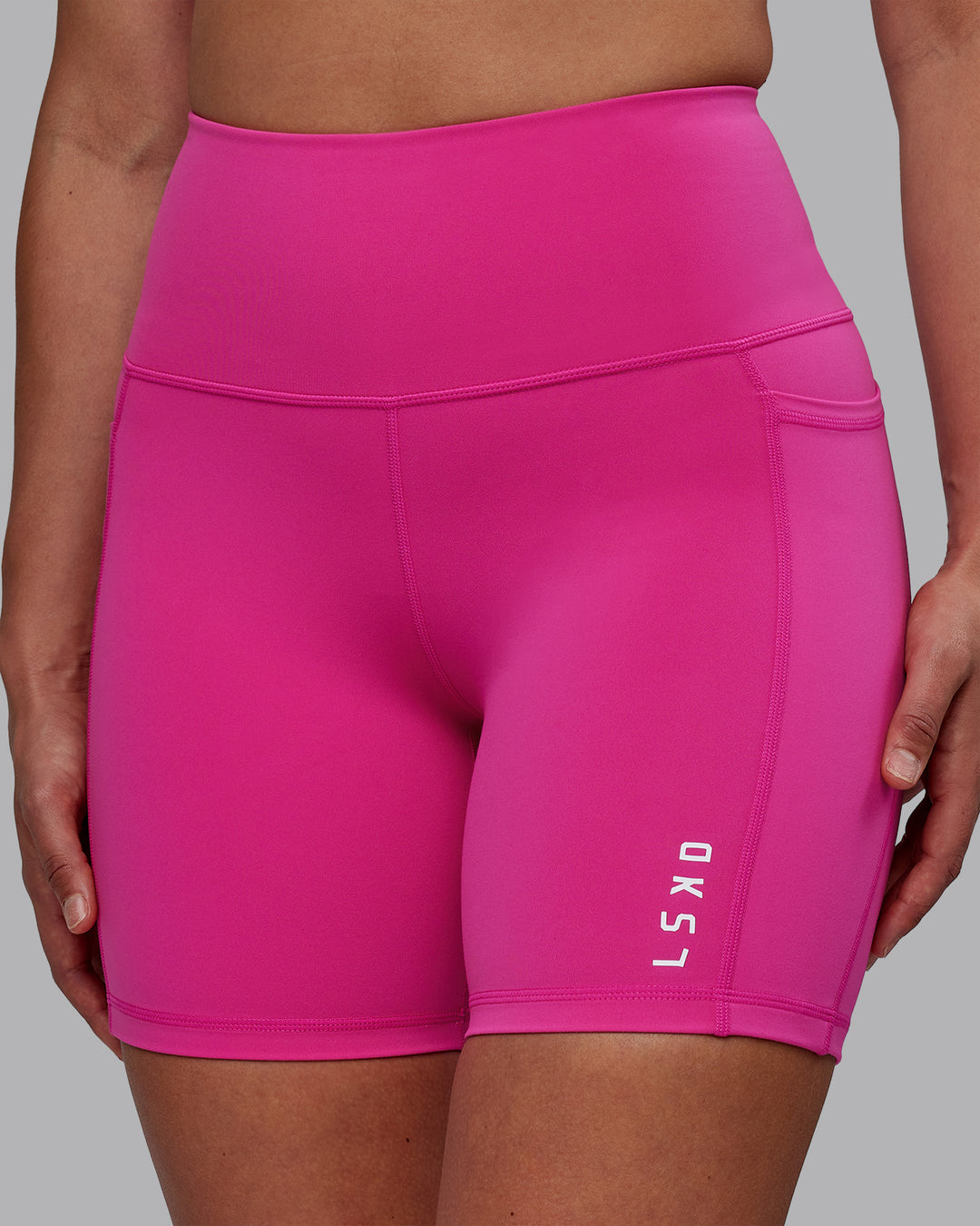 Woman wearing Flux Mid Short Tights - Fuchsia Pink