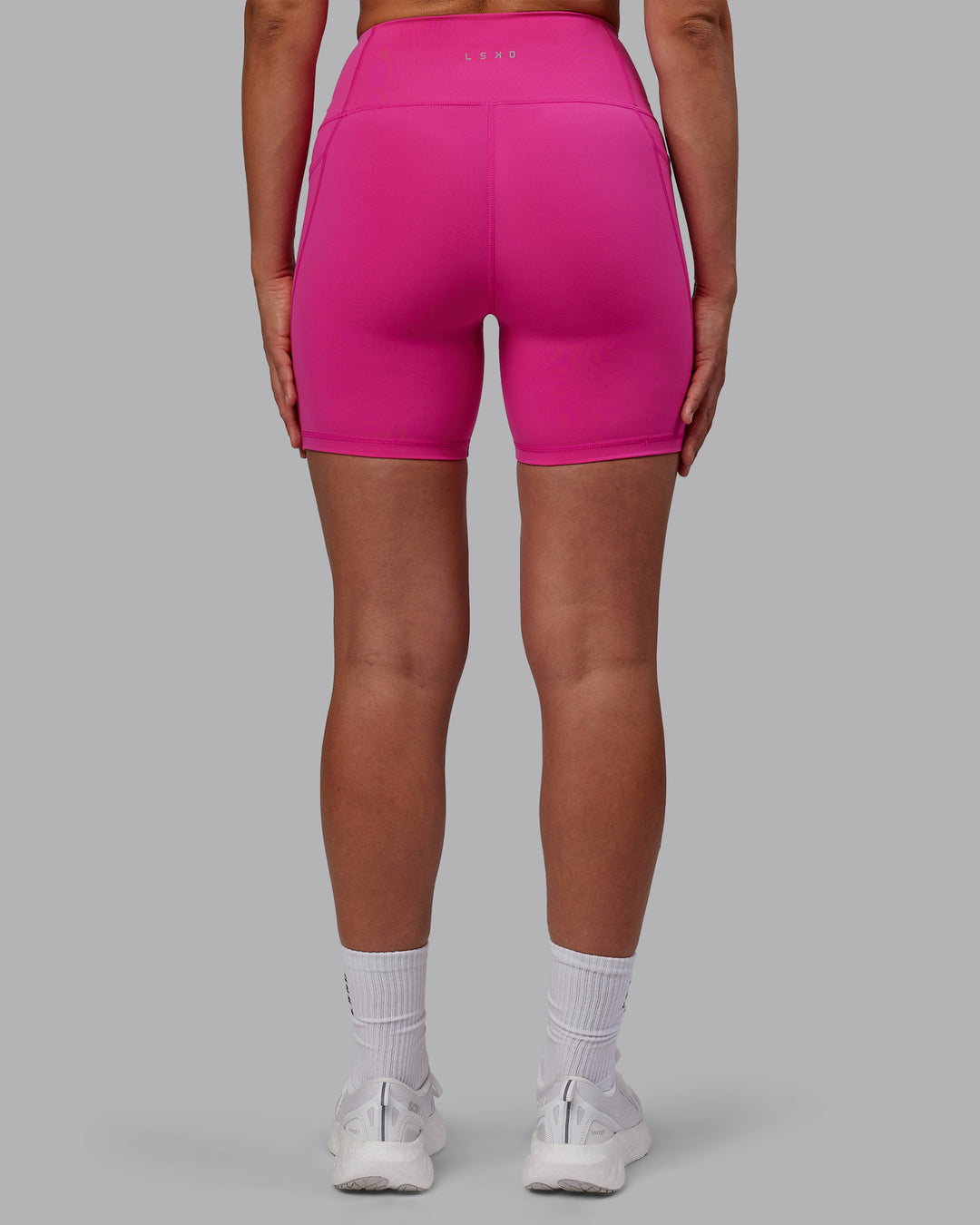 Woman wearing Flux Mid Short Tights - Fuchsia Pink