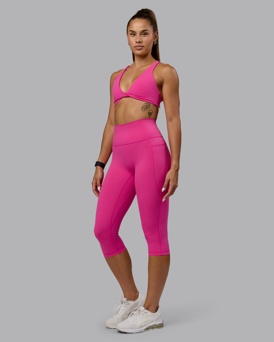 Woman wearing Fusion 3/4 Length Tights - Fuchsia Pink