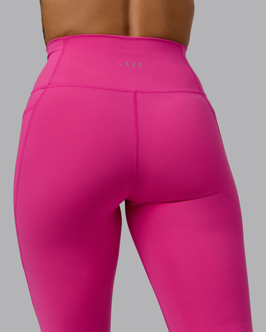 Woman wearing Fusion 3/4 Length Tights - Fuchsia Pink