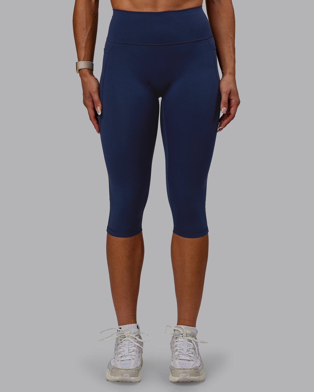 Woman wearing Fusion 3/4 Length Tights with Pockets - Future Navy