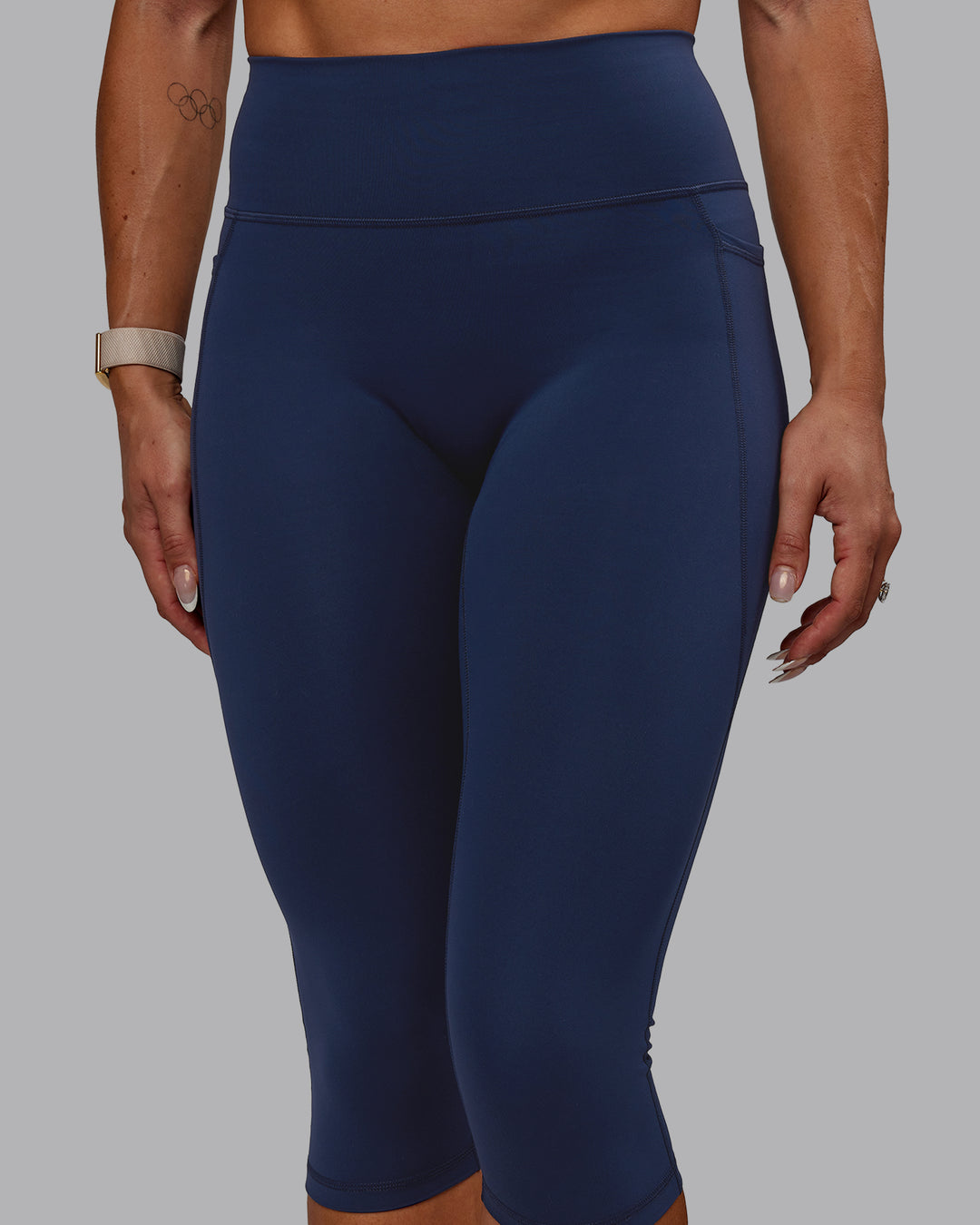 Woman wearing Fusion 3/4 Length Tights with Pockets - Future Navy