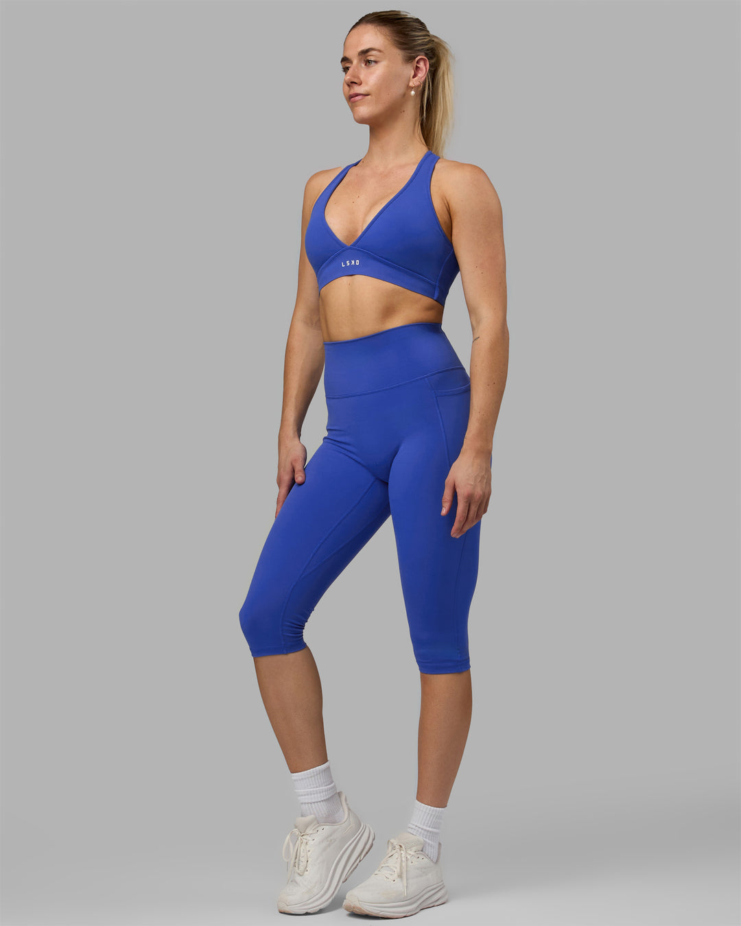 Woman wearing Fusion 3/4 Length Tights - Power Cobalt