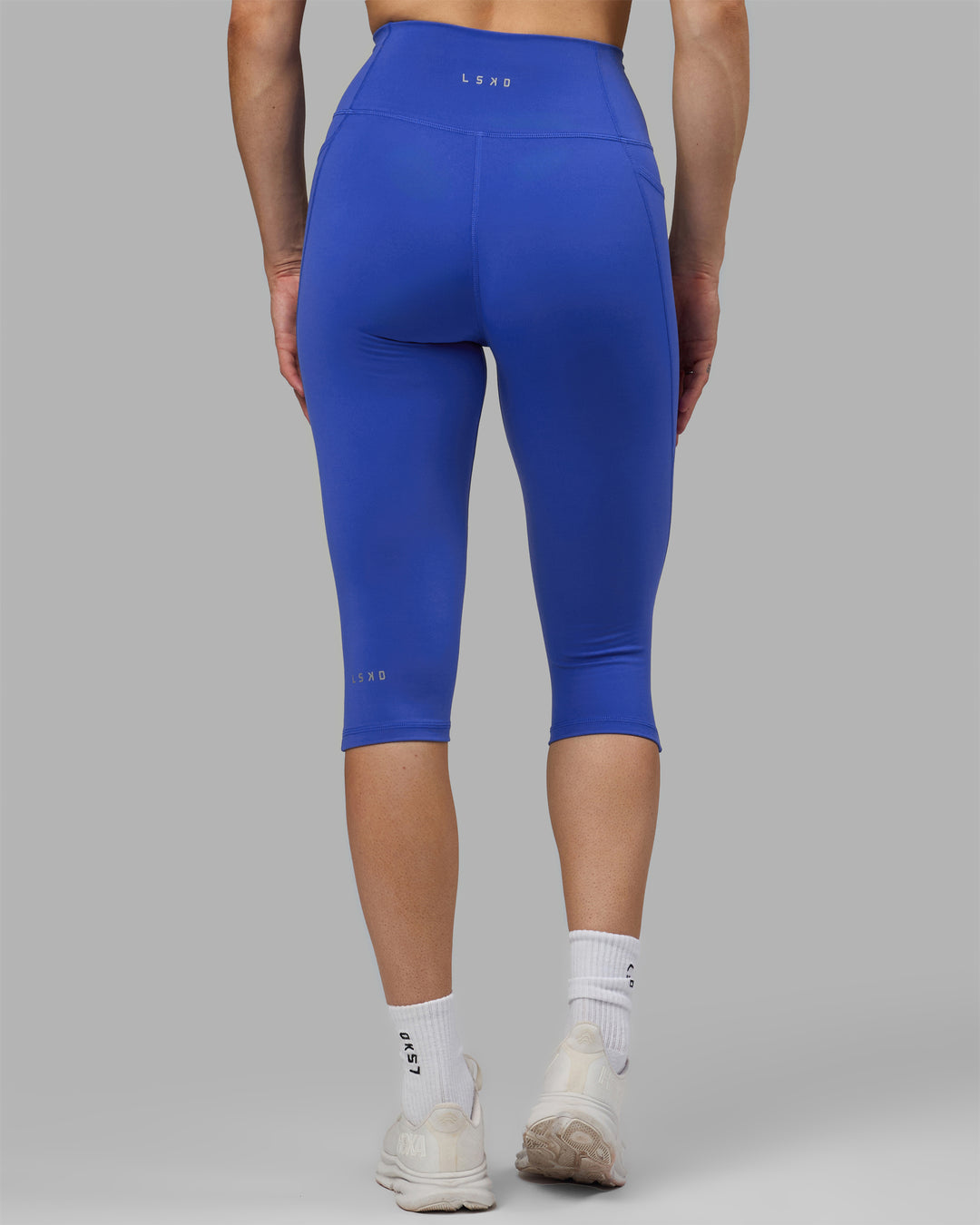 Woman wearing Fusion 3/4 Length Tights - Power Cobalt