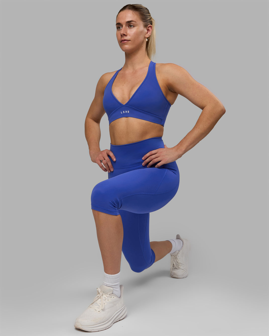 Woman wearing Fusion 3/4 Length Tights - Power Cobalt