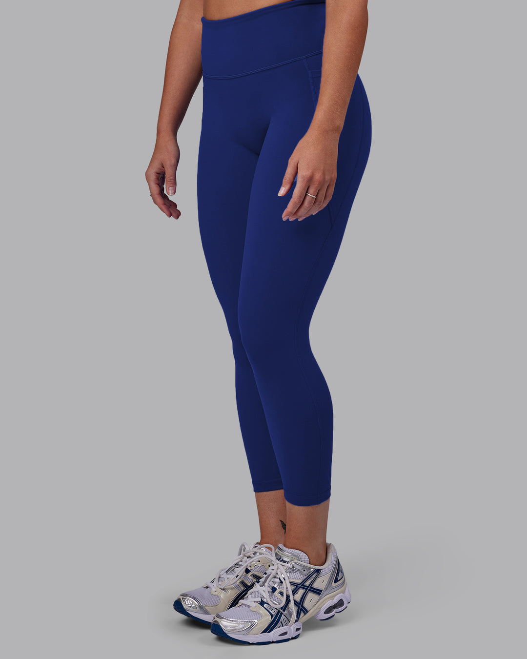 Woman wearing Fusion 7/8 Length Tights - Midnight Blue