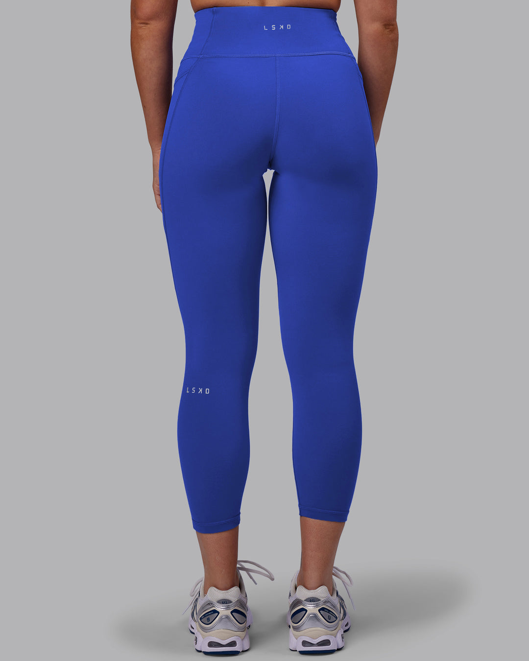 Woman wearing Fusion 7/8 Length Tights - Power Cobalt