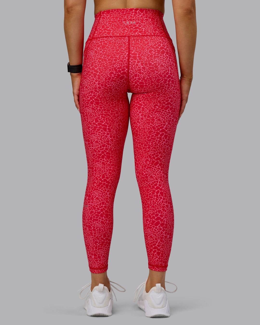 Woman wearing Fusion 7/8 Length Tights - Red Vitality Print