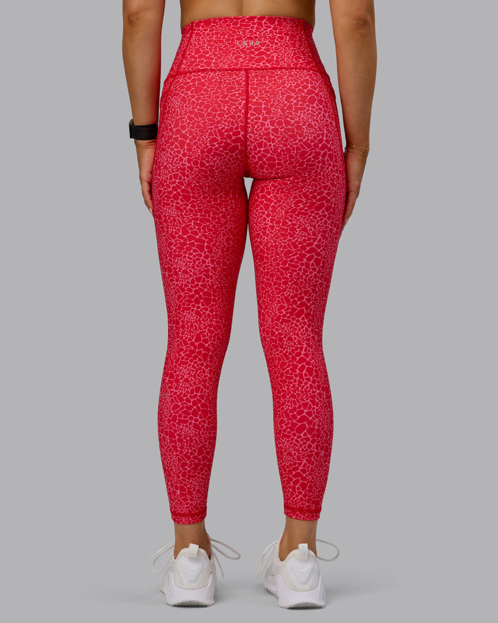 Woman wearing Fusion 7/8 Length Tights - Red Vitality Print
