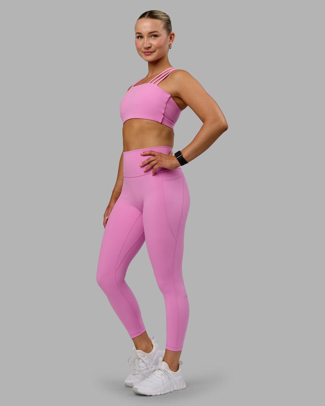 Woman wearing Fusion 7/8 Length Tights - Spark Pink