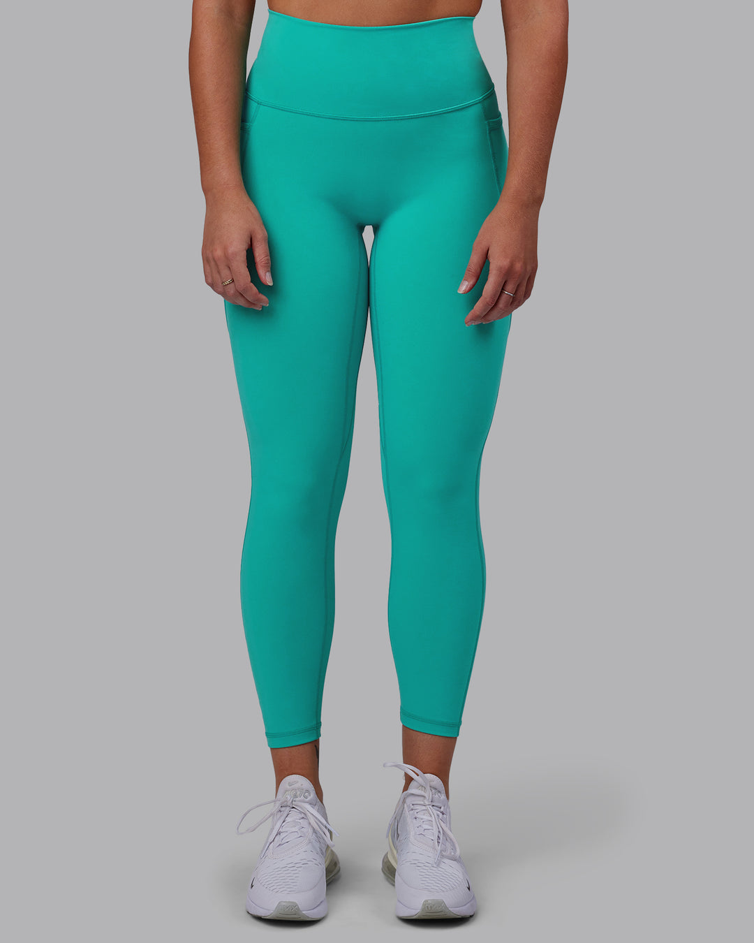 Woman wearing Fusion 7/8 Length Tights - Turquoise Tide