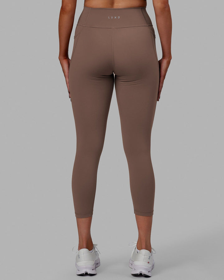 Woman wearing Fusion 7/8 Length Tight - Deep Taupe
